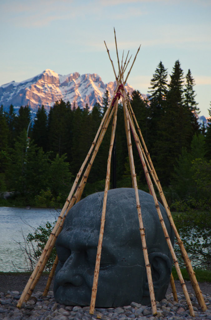 Temporary Installation: "CAMP - Land Claim" over "The Big Head" in Canmore, AB.