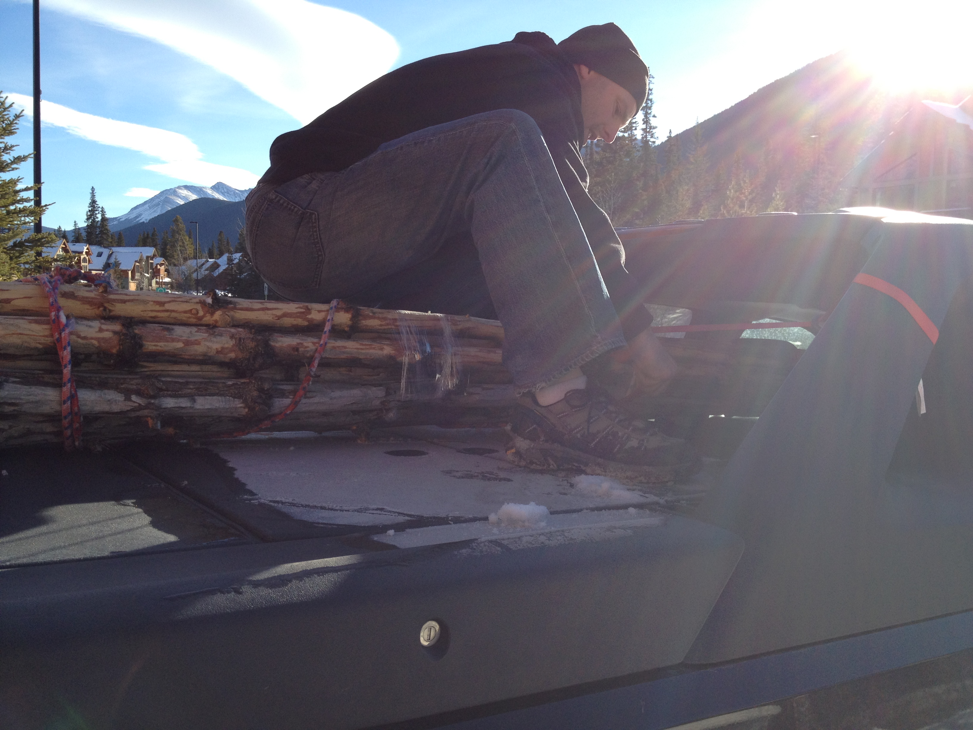 Kevin straps the tipi installation to the truck on a cold December morning.